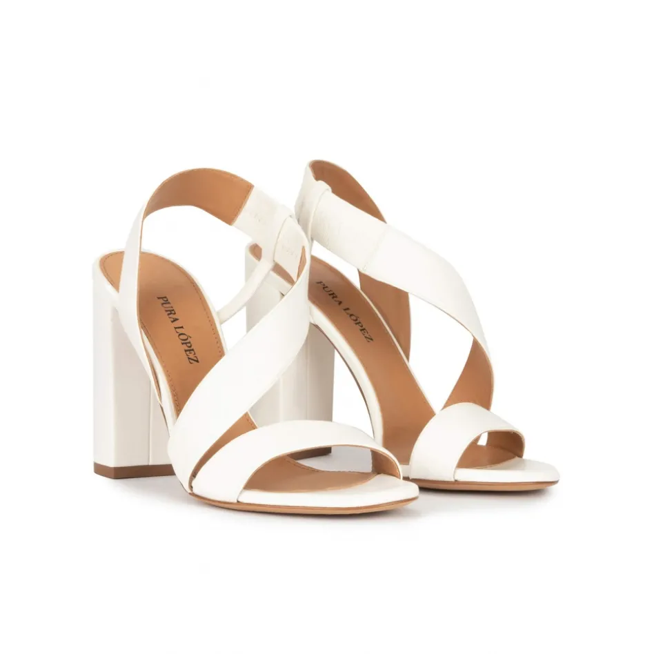 Aquira High block heel sandals in off-white leather