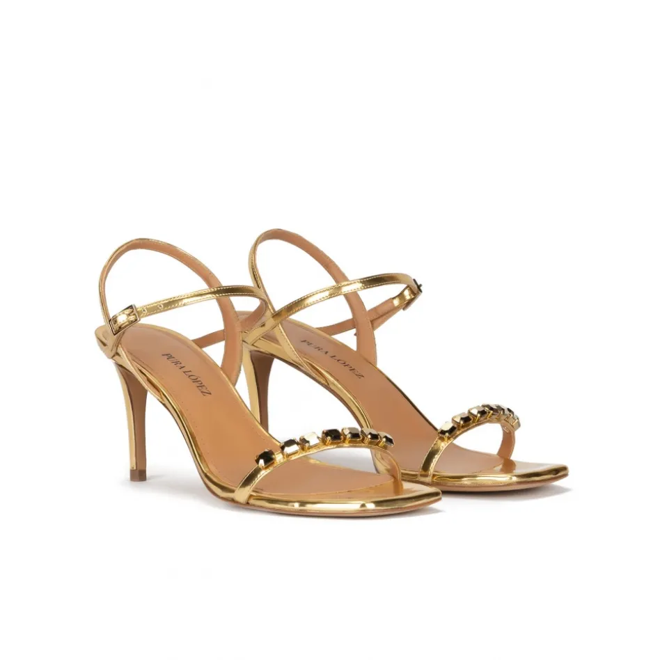 Evangelique Crystal-embellished mid heel sandals in gold leather