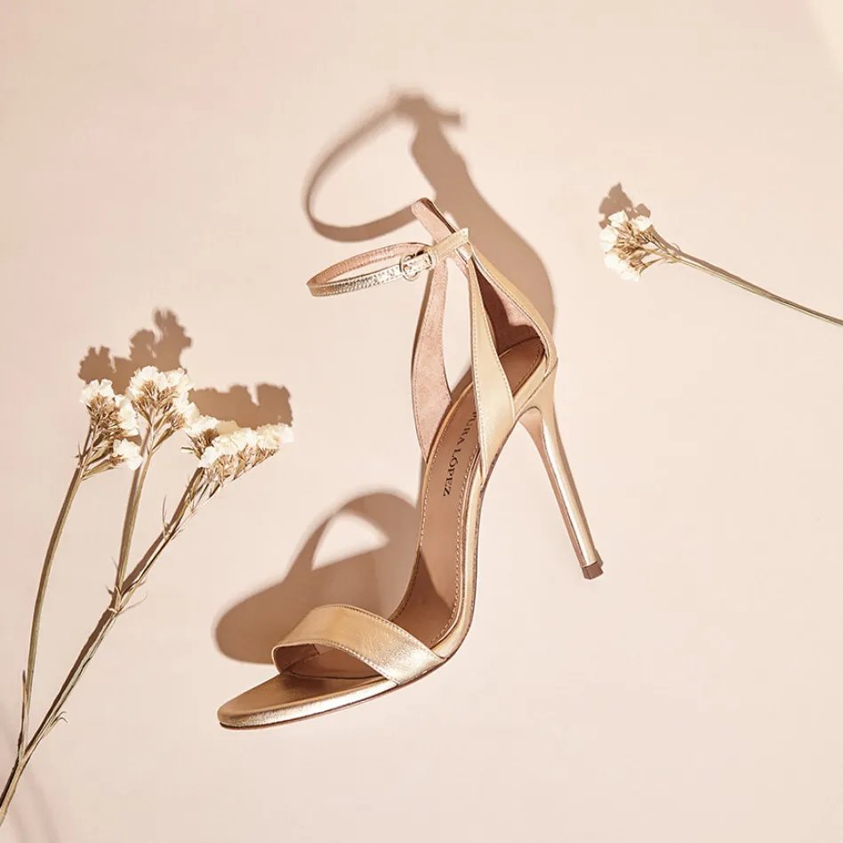 Martina Ankle-strap high heeled sandals in gold metallic leather