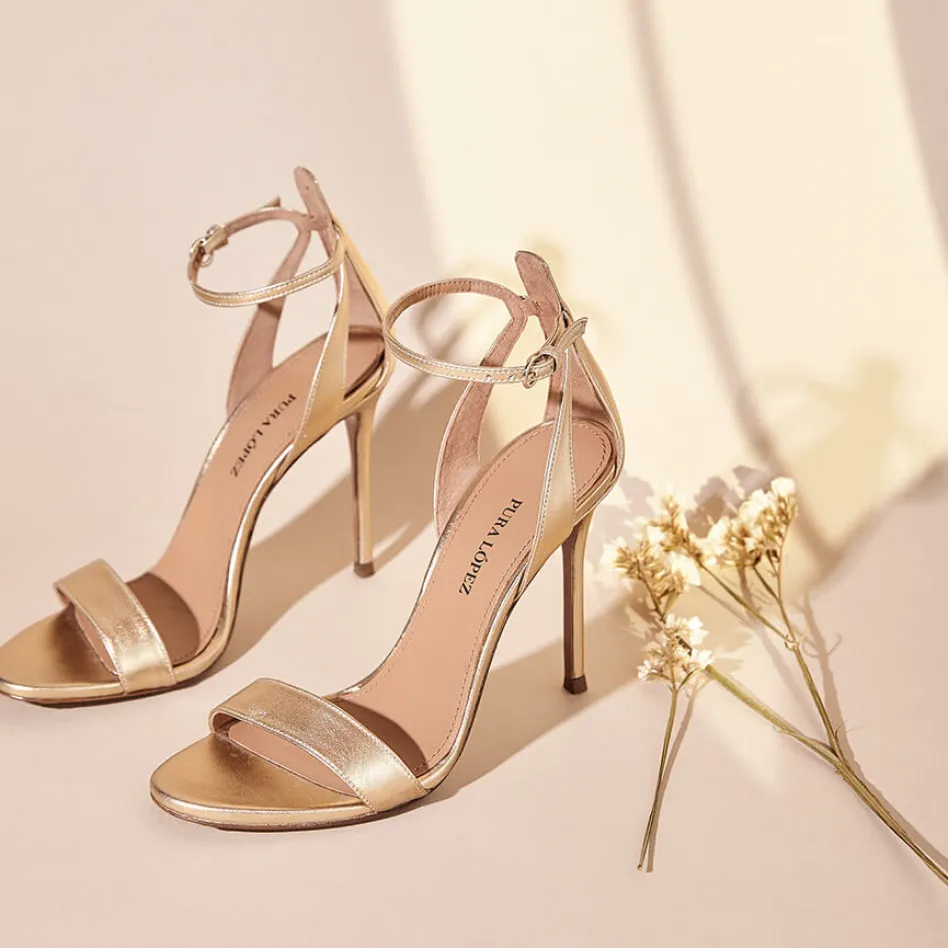 Martina Ankle-strap high heeled sandals in gold metallic leather