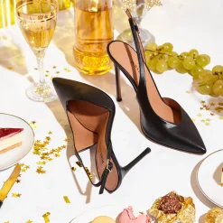 Omeya Black leather asymmetric heeled slingback pumps