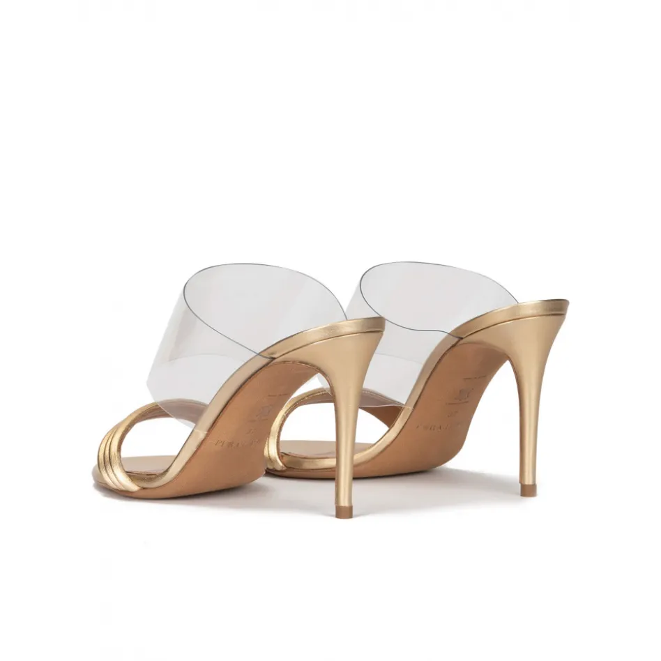 Osana High heel mules in gold leather and transparent vinyl