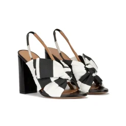 Quirina Bow detailed high block heel sandals in black and white