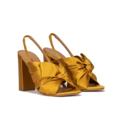 Quirina Bow-detailed high block heel sandals in mustard satin